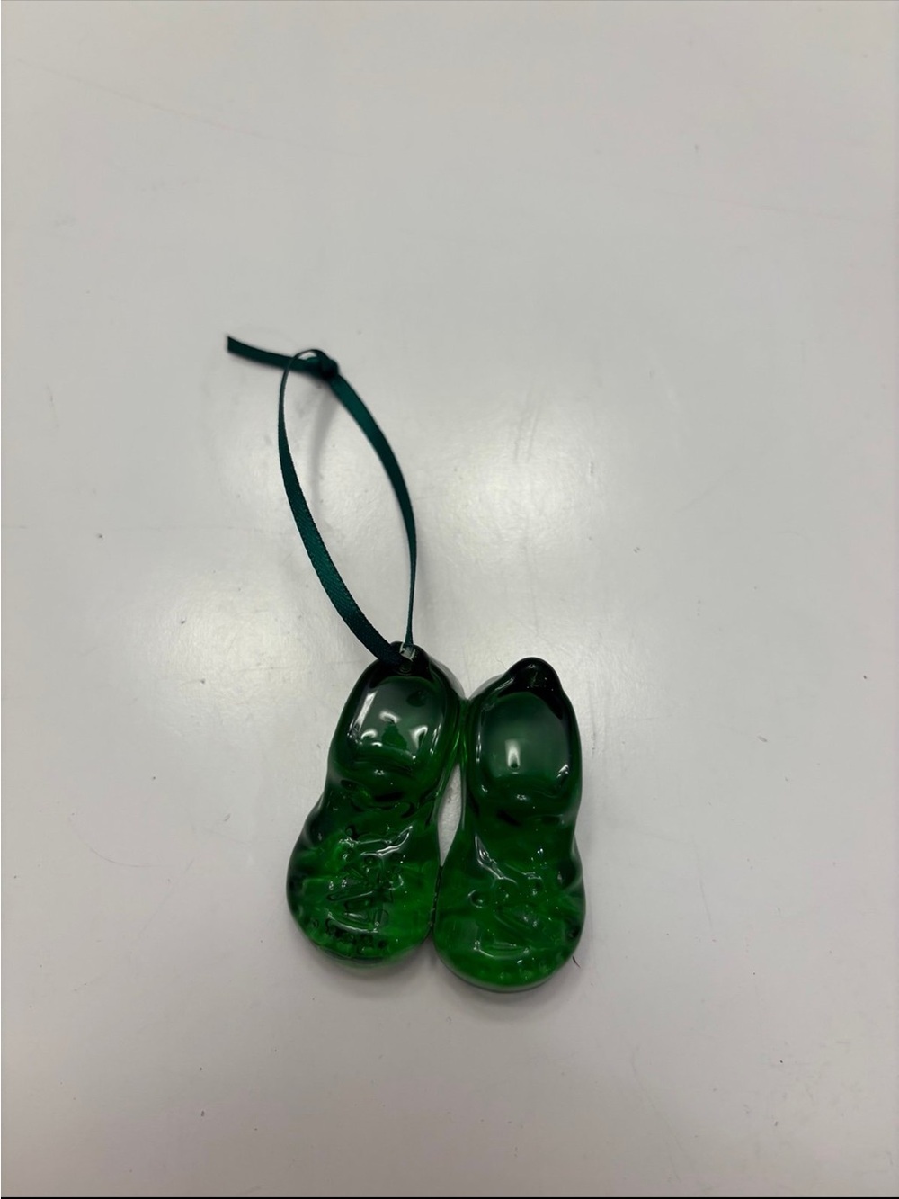 Green glass pair of shoes ornament 2023